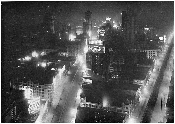 New-York bij avond. Links Broadway; rechts Sixth Avenue.