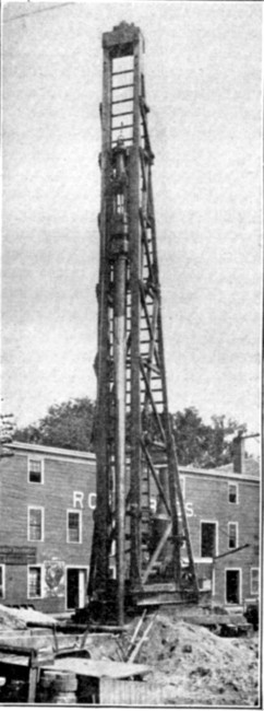 Fig. 49.—Pile Driver Rigged for Constructing Raymond
Concrete Piles.