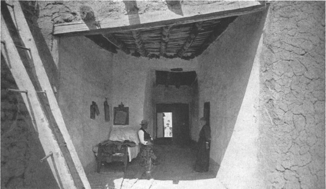 An excellent example of the entrance to an adobe house of
the Southwest, embodying the best traditions of this kind of
architecture