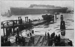 Photograph by Underwood & Underwood, N. Y.
SCENE IN GERMAN SHIP-BUILDING YARD
The great ship in the background has just been launched. Though the war left Germany no man to spare, every effort
has been made to materially increase the country's merchant marine. To-day Germany's mercantile fleet is stronger than ever.