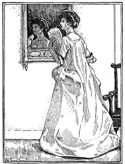 woman looking in mirror