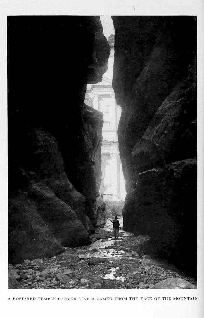 Photograph: A ROSE-RED TEMPLE CARVED LIKE A CAMEO FROM THE FACE OF THE MOUNTAIN