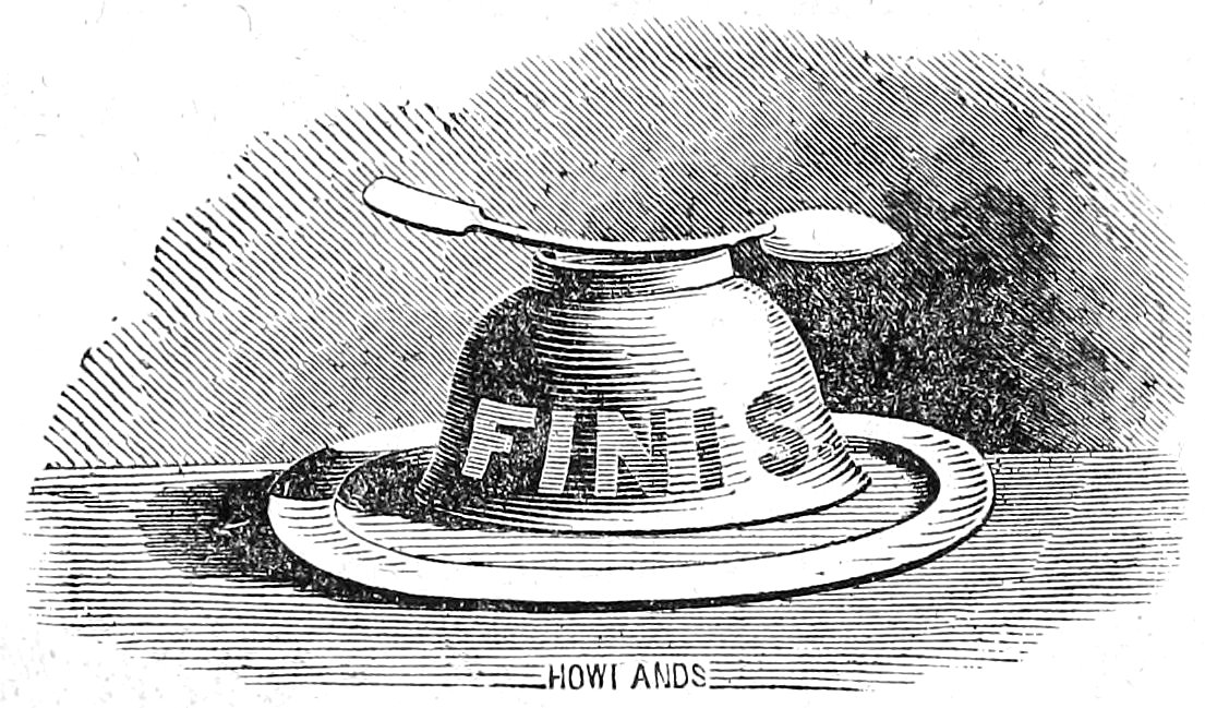 An upside-down teacup sitting on a saucer with a spoon balanced horizontally across its base. The word "FINIS" is written across the side of the cup.
