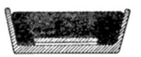 A diagram of
an open rectangular container or trough with a dark, textured (possibly
liquid or powder) substance filling the bottom portion.