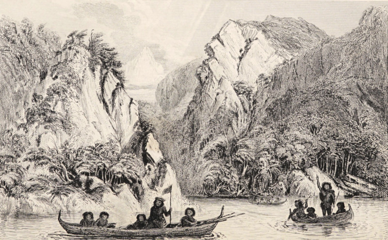 Small canoe with family near Button Island